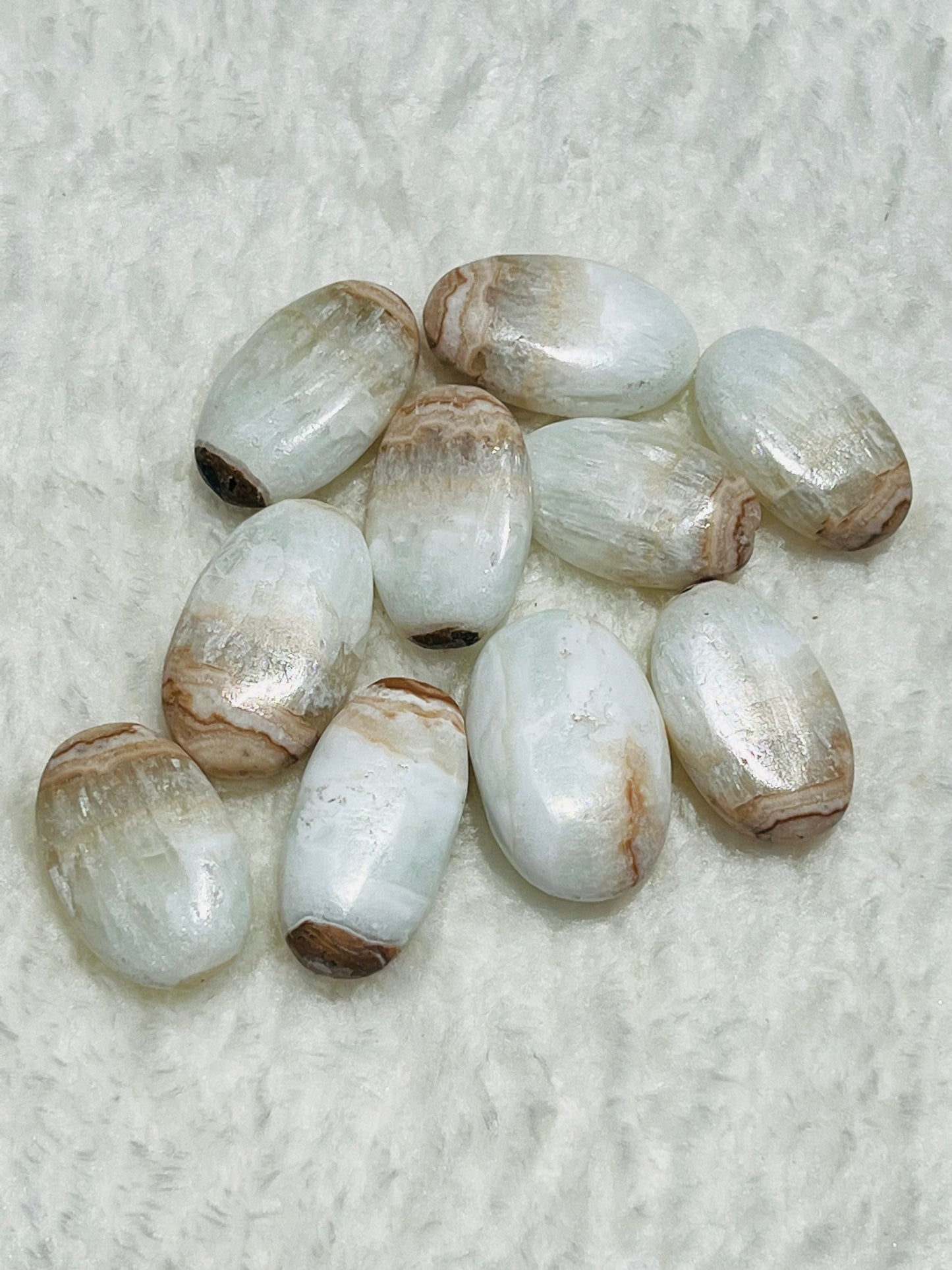 Caribbean Calcite Mini Palmstone - Zoee Crystals