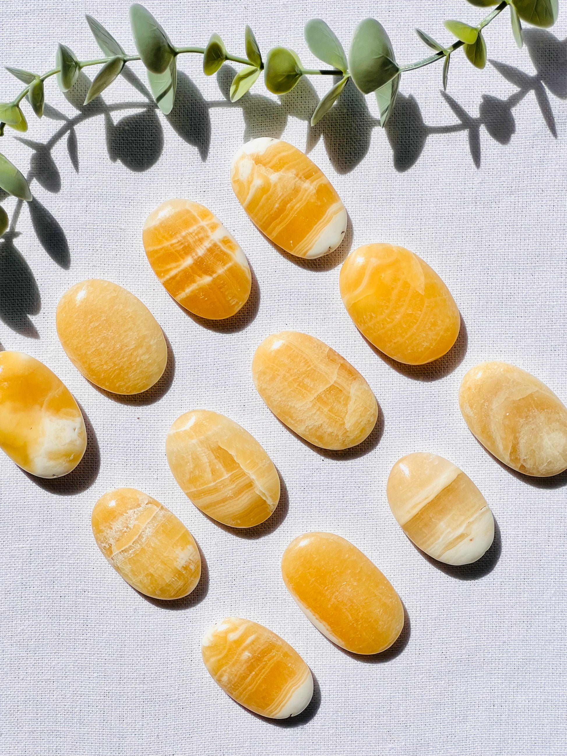 Orange Calcite Mini Palmstone - Zoee Crystals