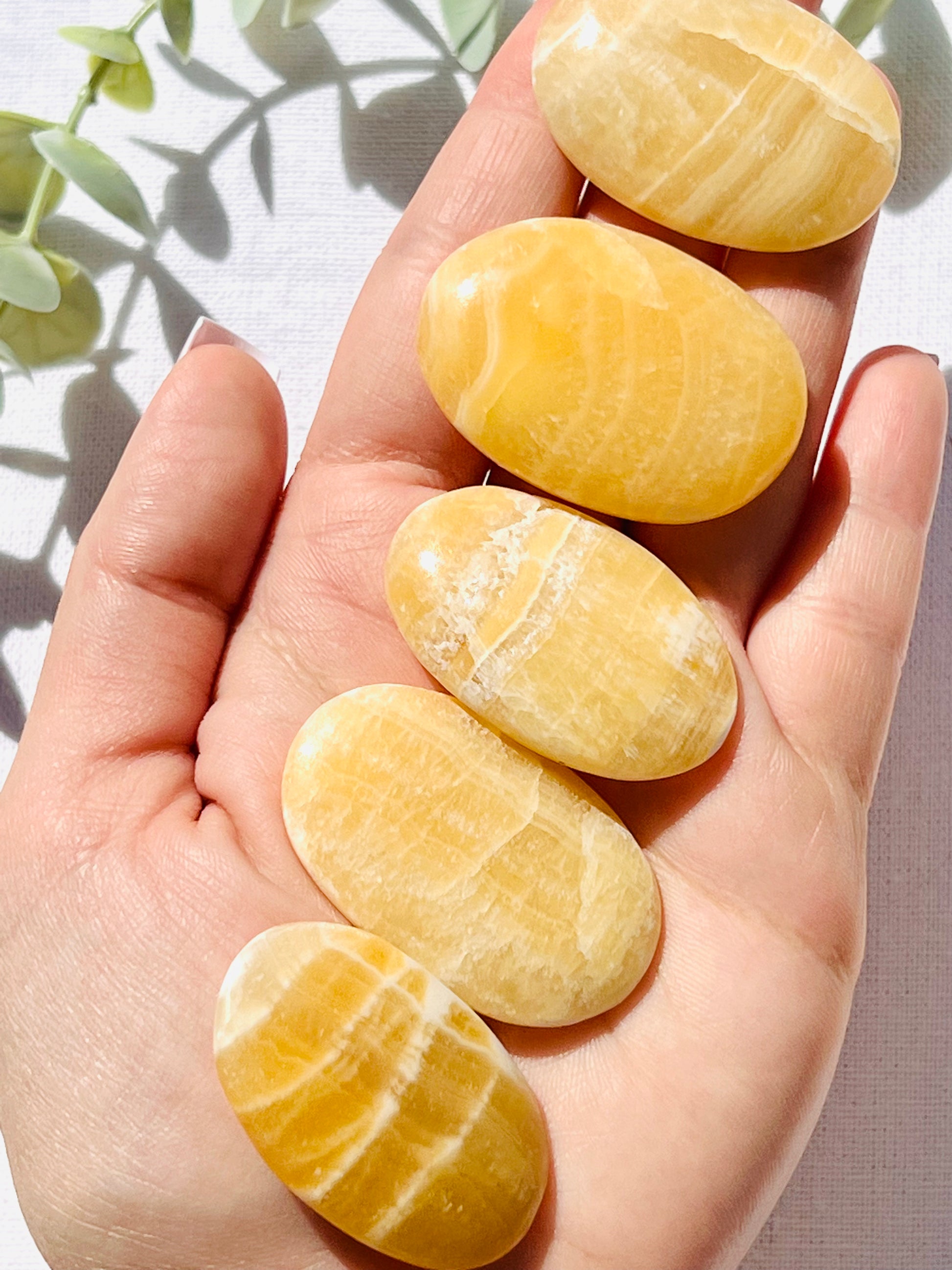 Orange Calcite Mini Palmstone - Zoee Crystals
